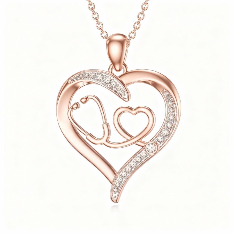Collier pendentif cœur et stéthoscope en or rose 9 carats et moissanite-1