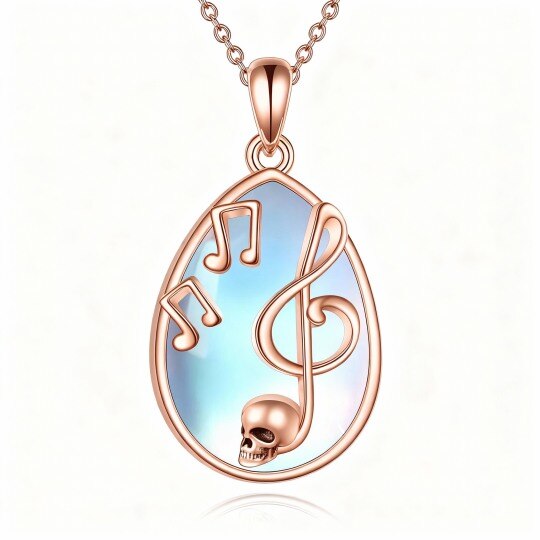 Halskette aus 10-karätigem Roségold mit Mondstein, Musiksymbol und Totenkopfanhänger
