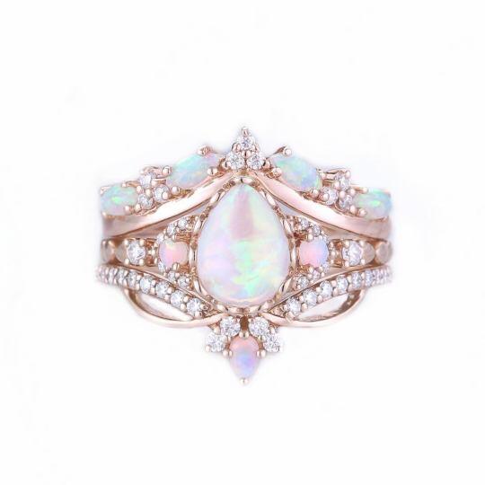 Conjunto nupcial de oro rosa de 10 quilates con ópalo talla pera