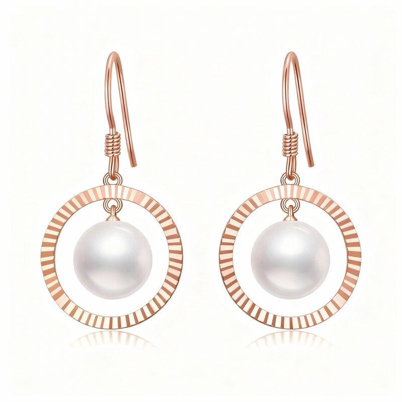 Boucles d'oreilles pendantes rondes en or rose 14 carats avec perles.-1