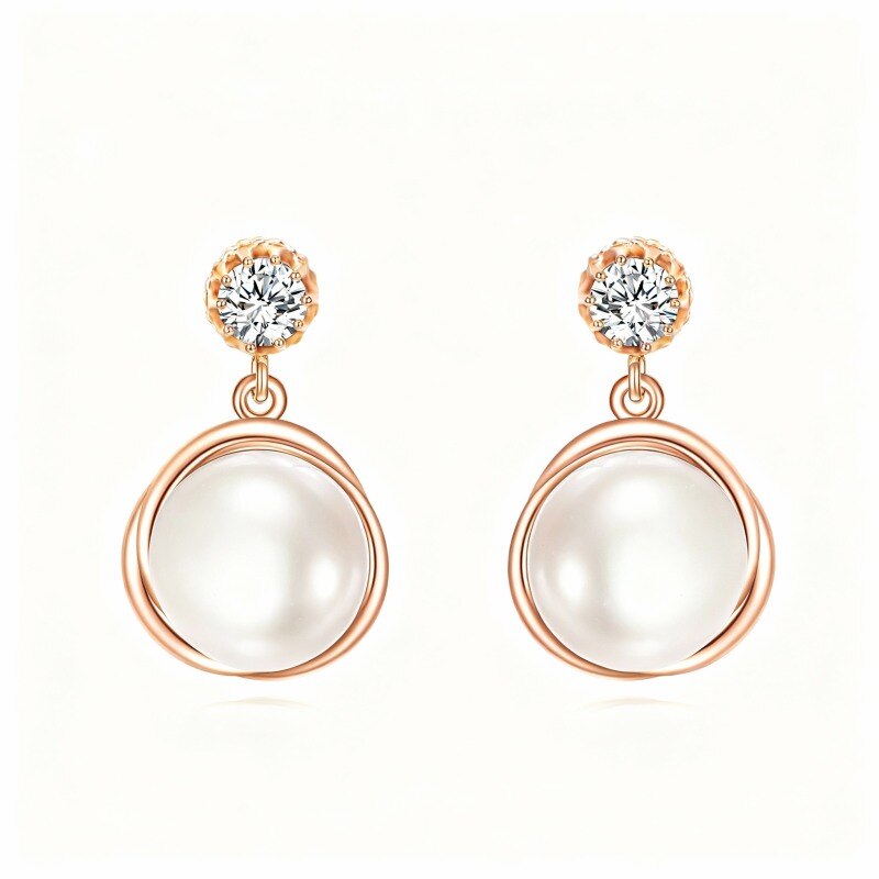 Boucles d'oreilles puces en or rose 18 carats avec perles rondes.-1