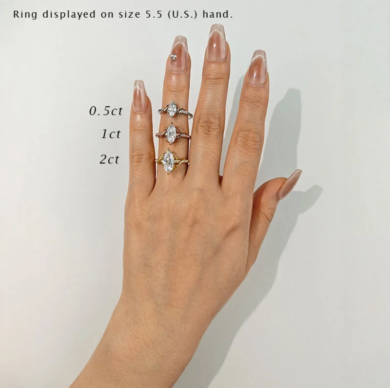 Anillo de compromiso de oro bicolor de 10 quilates con diamantes de talla marquesa, color D, claridad VVS-VS, certificado IGI 3EX.-4