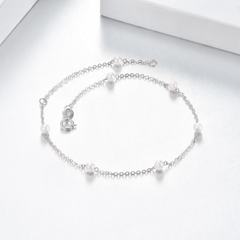 Pulsera con dije de perla en oro blanco de 10 quilates-4