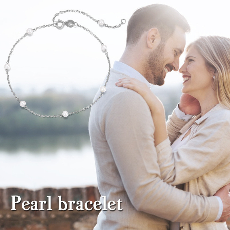 Pulsera con dije de perla en oro blanco de 10 quilates-5