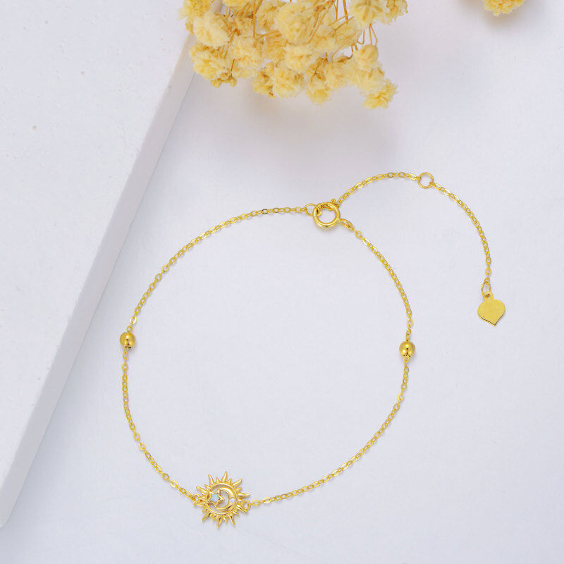 Pulseira em ouro branco 10K com pendente de lua e sol, diamantes de lapidação redonda e opala.-3