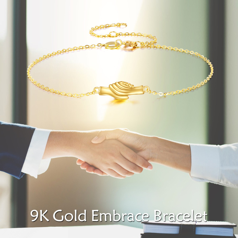 Pulseira com pendente mãos dadas em ouro branco 9K-6