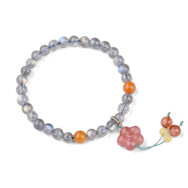 Pulsera con colgante de flor de cerezo y piedra lunar de ágata en forma circular