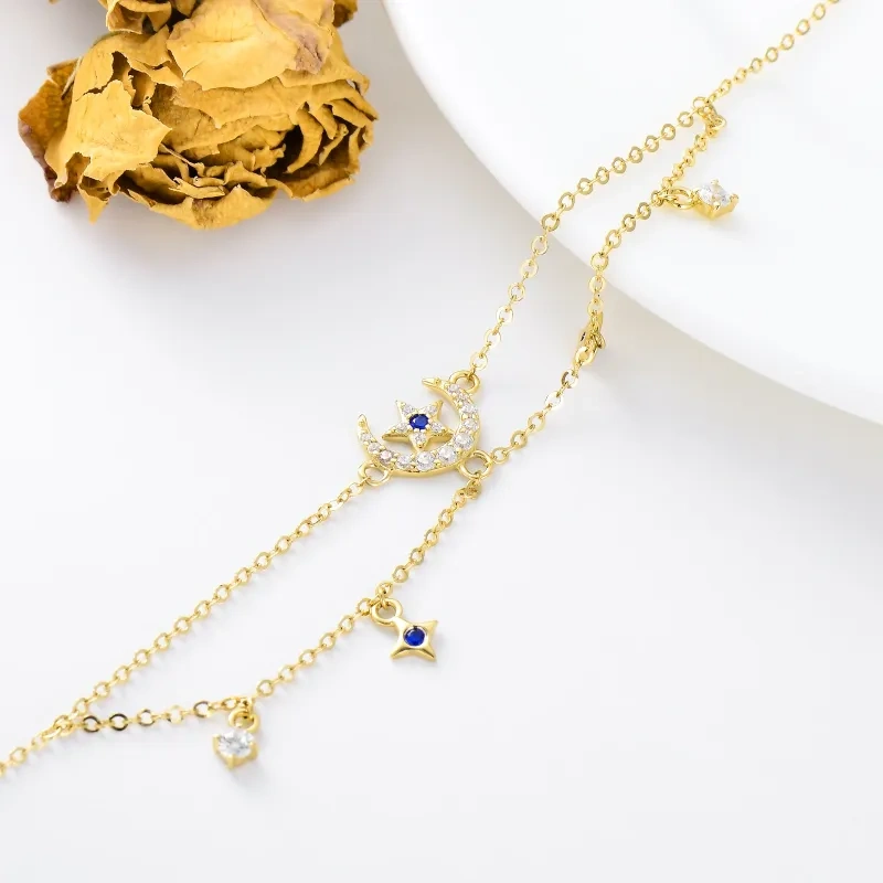 Tobillera con dije multicapa de luna y estrella de circonita en oro de 14 quilates-4