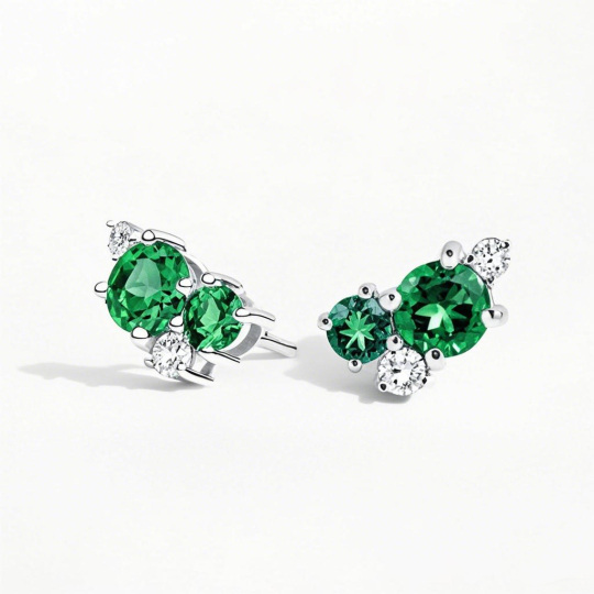 Kolczyki z białego złota 14K o masie 0,16 CT.T.W. z szmaragdowymi diamentami i bukietem liści