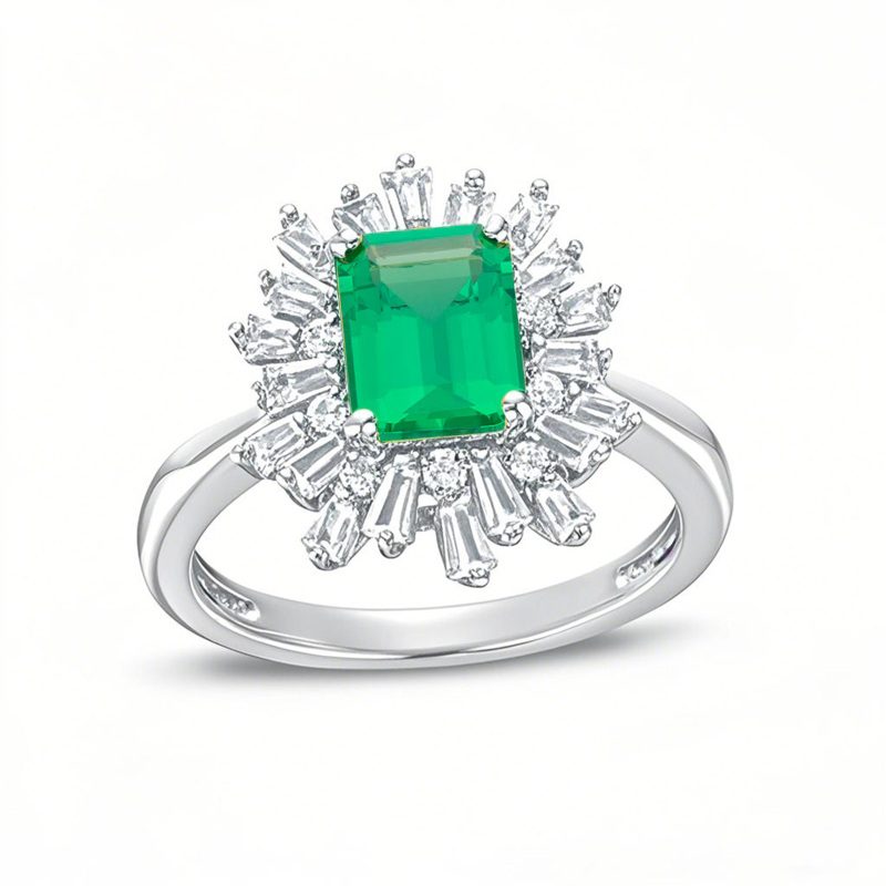 Anillo de compromiso de platino con esmeralda talla esmeralda y montura en forma de estrella de diamantes-1