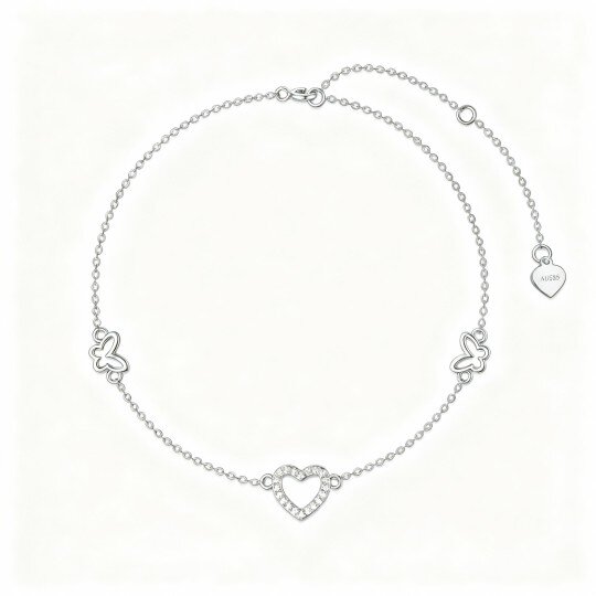 Pulseira em ouro branco 10K com pendente de borboleta e coração em zircónia cúbica.