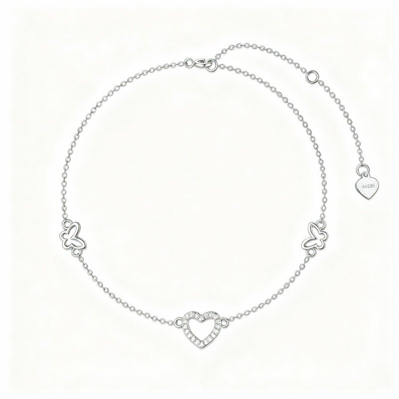Pulseira em ouro branco 10K com pendente de borboleta e coração em zircónia cúbica.-1