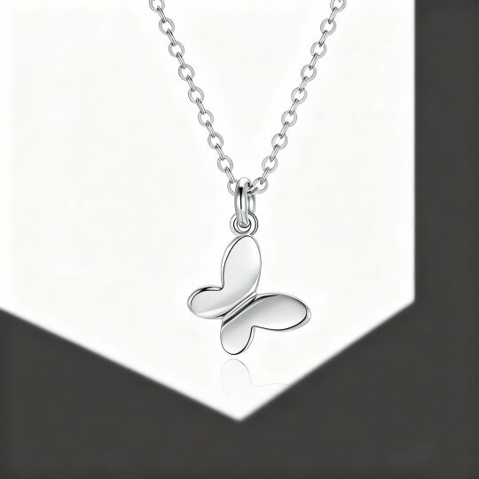 Collier pendentif papillon en or blanc 10 carats