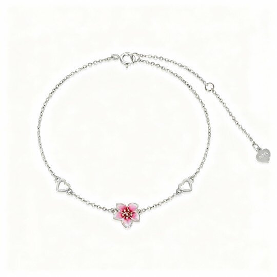 Pulseira com pendente de flor de cerejeira e coração em ouro branco 10K