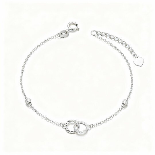 Armband met een cirkel en oneindigheidssymbool van 10 karaat witgoud