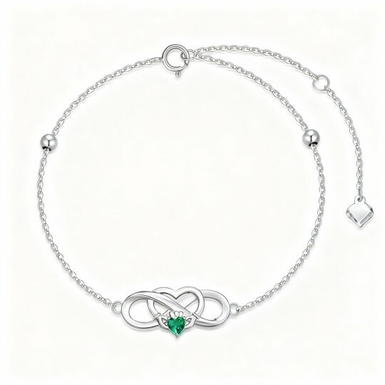 Personalisiertes Armband aus 10-karätigem Weißgold mit Kristallanhängern: Geburtsstein, Krone, Herz und Unendlichkeitssymbol