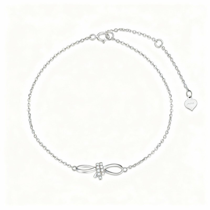 Pulsera de oro blanco de 10 quilates con dije de lazo y corazón de diamantes-10