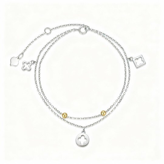 Pulseira em ouro branco de 10 quilates com pendente de trevo de quatro folhas, missangas e cruz.