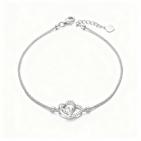 Pulseira em ouro branco 10K com pendente de coração e zircónias cúbicas.