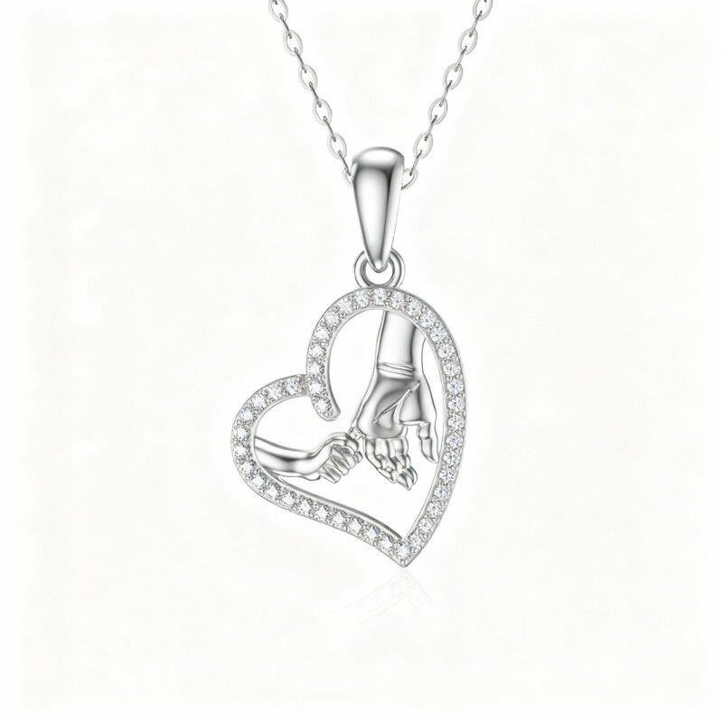 Colar com pendente de coração e mãos entrelaçadas em zircónias cúbicas banhadas a platina e ouro branco-1
