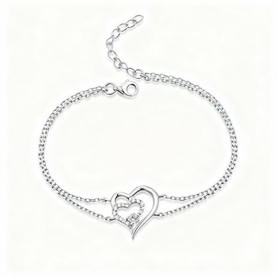 Pulseira em camadas com corações cravejados de zircónias cúbicas em ouro branco de 10 quilates
