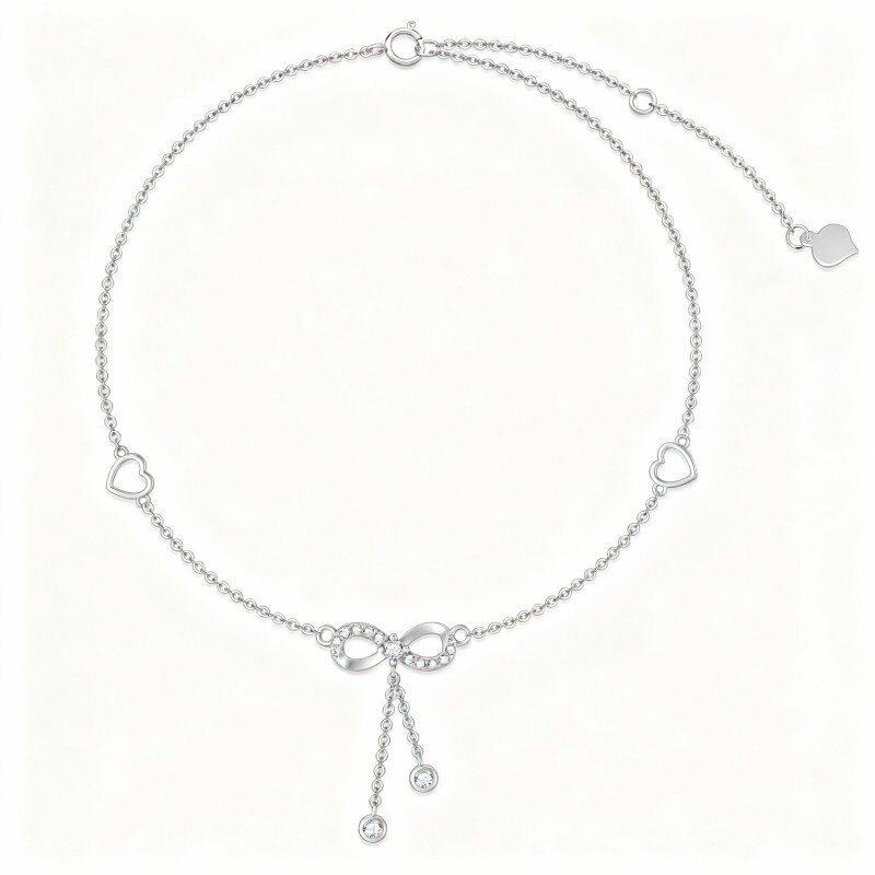 Tornozeleira de uma só camada com pendente de laço e coração em moissanita em ouro branco 10K-16
