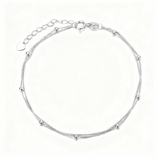 Tornozeleira de corrente multicamadas em ouro branco 10K