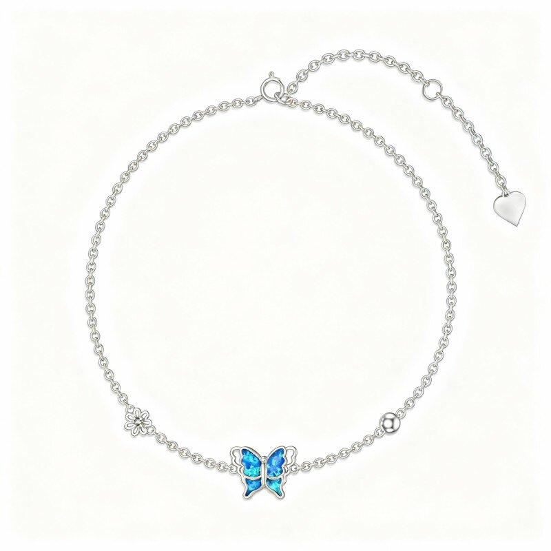 Pulseira em ouro branco 10K com pendentes de borboleta, margarida e missangas em opala.-9