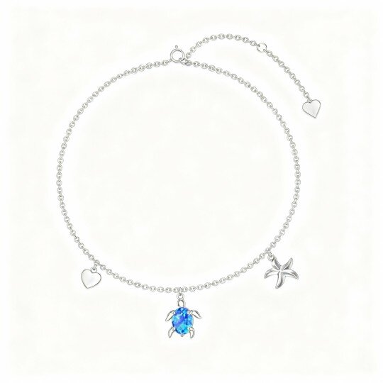 Tobillera de oro blanco de 10 quilates con dije de tortuga marina, estrella de mar y concha de ópalo ovalado de una sola capa