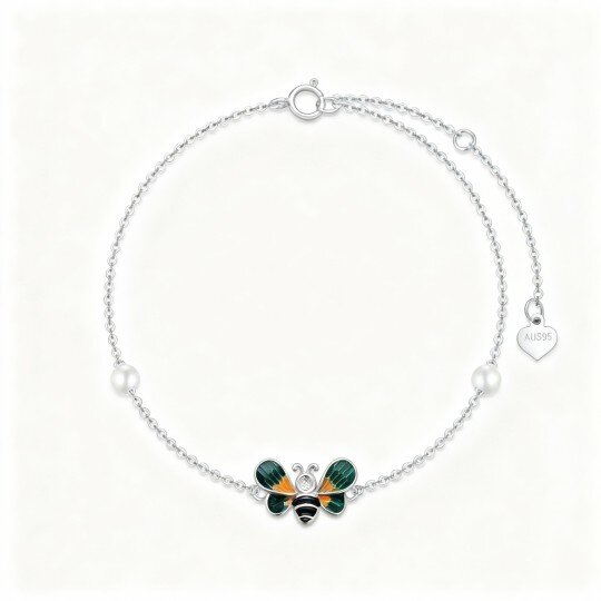 Pulsera con dije de abeja y perla en oro blanco de 10 quilates