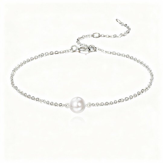 Pulsera con dije de perla en oro blanco de 10 quilates