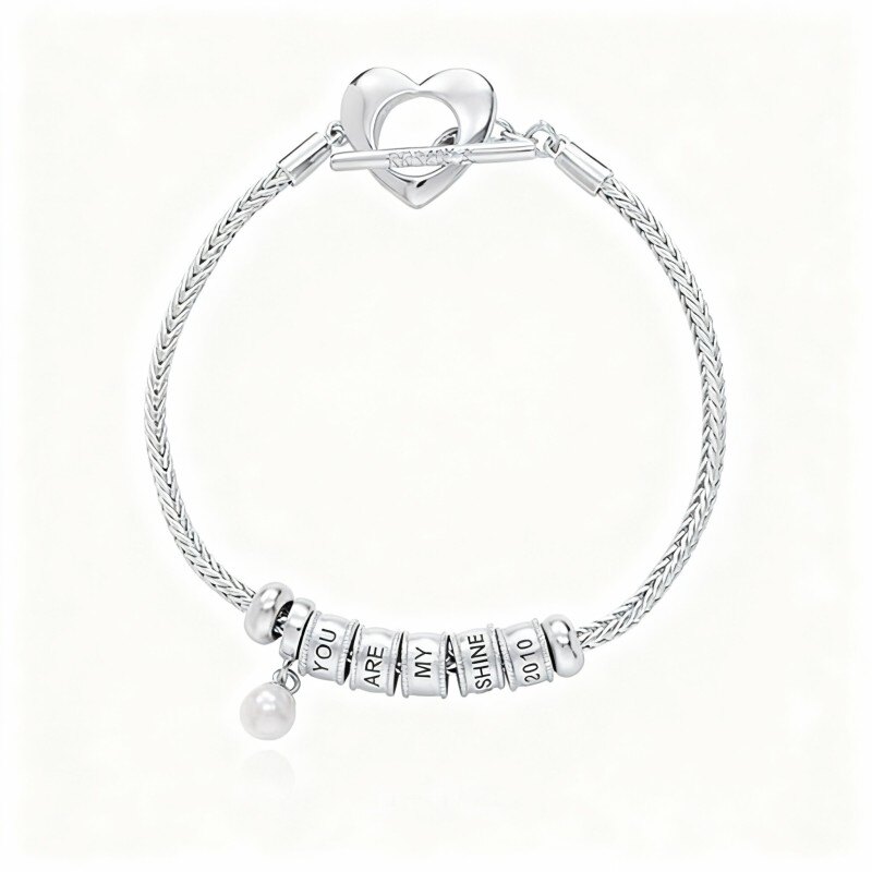 Pulsera con dije grabado personalizado de perla en oro blanco de 18 quilates-1