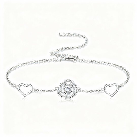 Pulseira em ouro branco 10K com pendente de rosa e coração em zircónia cúbica.