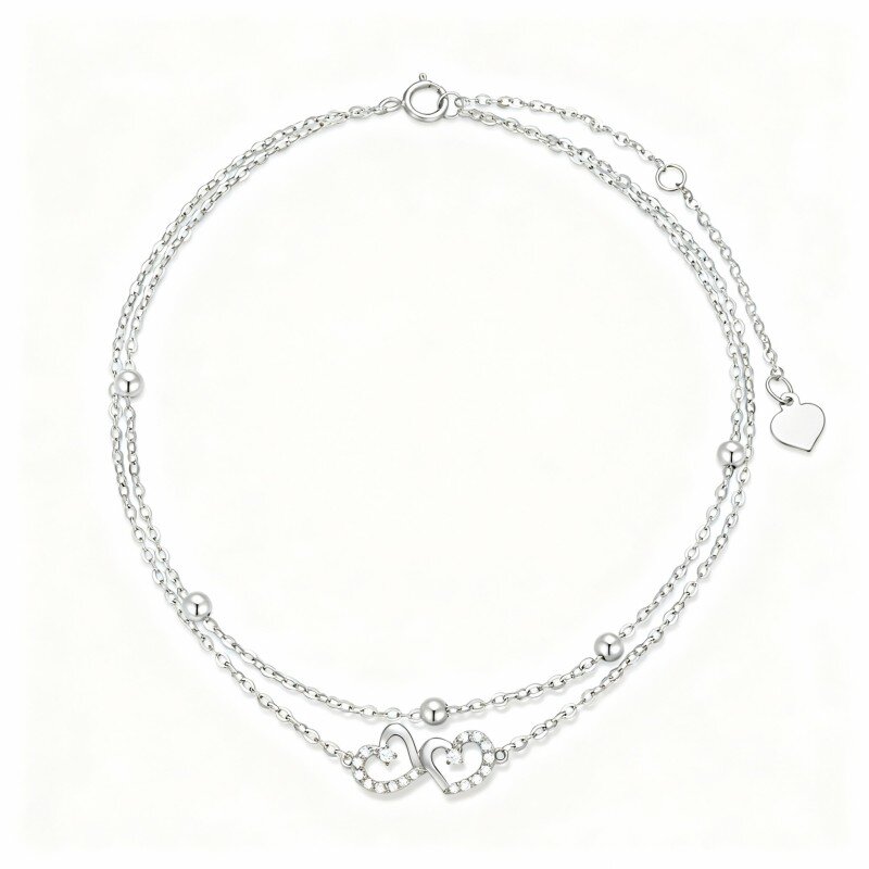 Tobillera de oro blanco de 10 quilates con circonita cúbica de talla redonda y dije de corazón con múltiples capas-8