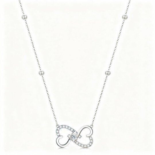 Colar com pendente coração e símbolo do infinito em ouro branco de 10 quilates com zircónias cúbicas de corte redondo