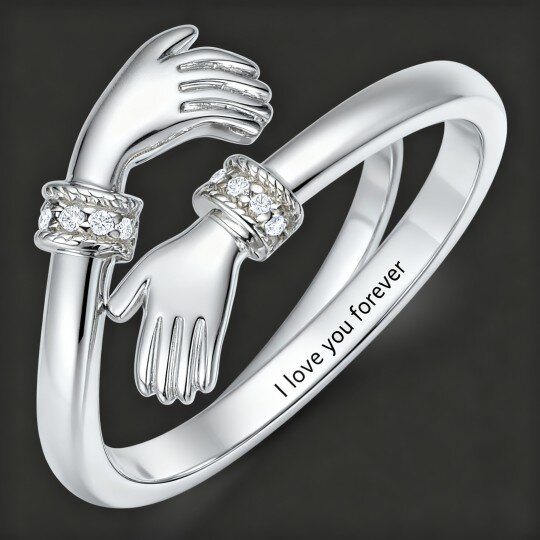 Anel personalizado com gravação em ouro branco de 9K e zircónia cúbica de corte redondo.