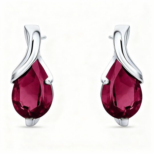 Brincos em ouro branco 10K com rubis em forma de gota, representando a avó e a mãe.