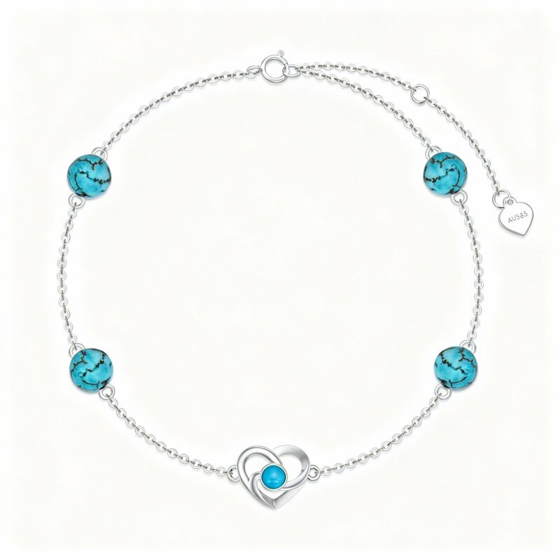 Pulseira em ouro branco 10K com turquesa, nó celta e coração, com pendente em forma de coração.-3