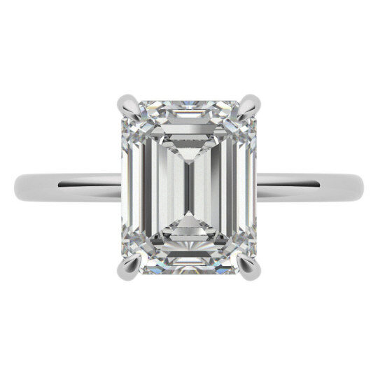 Anillo de compromiso con halo oculto de moissanita talla esmeralda en oro blanco de 10 quilates