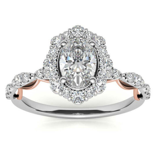 Anillo de compromiso de oro blanco de 10 quilates con moissanita de talla ovalada y halo