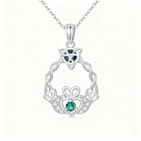 Halskette aus 10-karätigem Weißgold mit Anhänger in Form eines keltischen Knotens und des Claddagh-Griffs, verziert mit Abalone und Zirkonia.