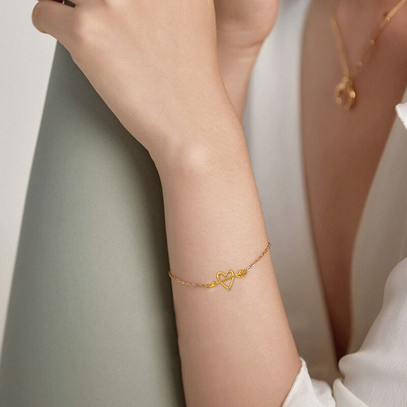 Bracelet à breloques flèche et cœur en or rose 18 carats-3