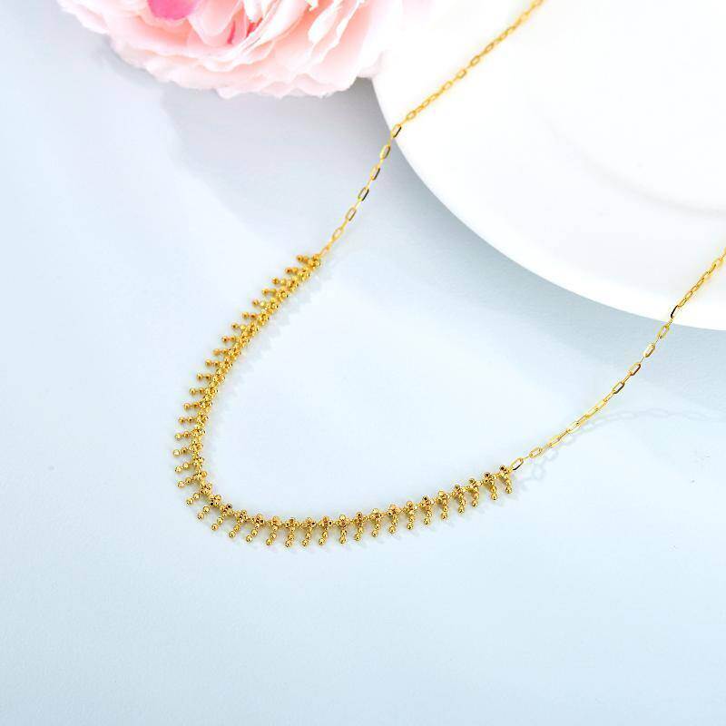 Naszyjnik choker z 14-karatowego złota z metalowymi koralikami-4
