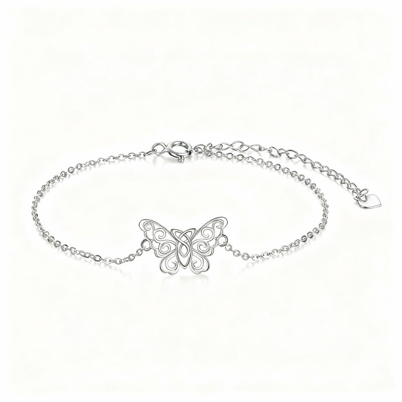 Pulsera con dije de mariposa y nudo celta en oro blanco de 10 quilates-1