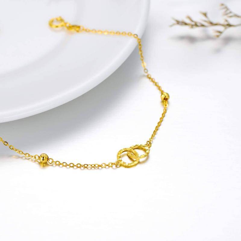 Pulsera con dije de círculo y símbolo de infinito en oro de 18 quilates-4