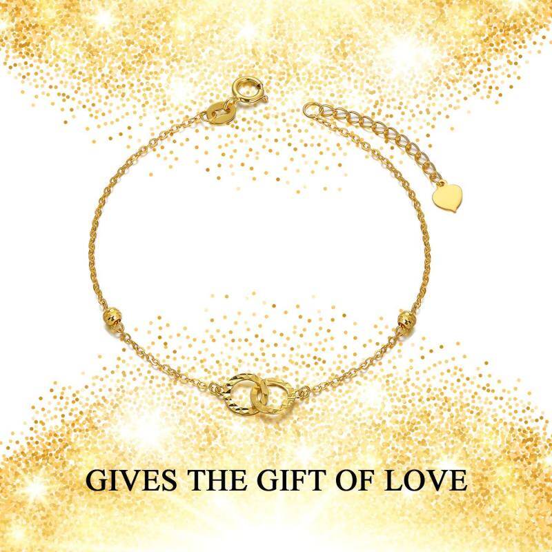 Pulsera con dije de círculo y símbolo de infinito en oro de 18 quilates-6