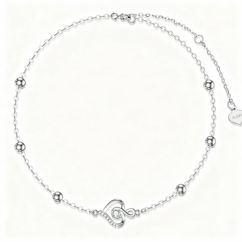 Armband aus 10-karätigem Weißgold mit Zirkonia-Perlen, Herz- und Unendlichkeitssymbol-1
