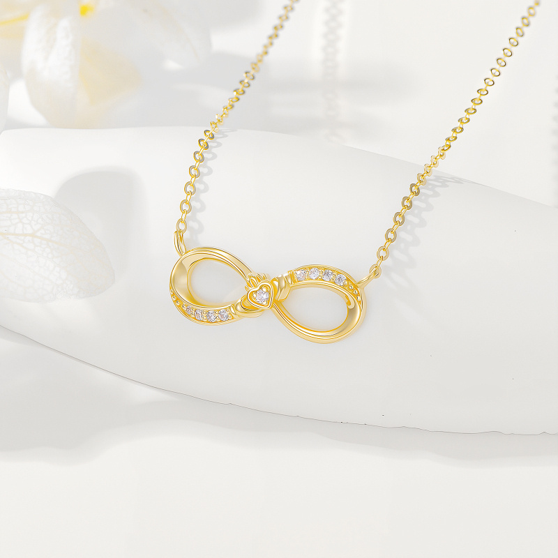 Collar con colgante de oro de 14 quilates con circonitas cúbicas, símbolo Claddagh e infinito-2