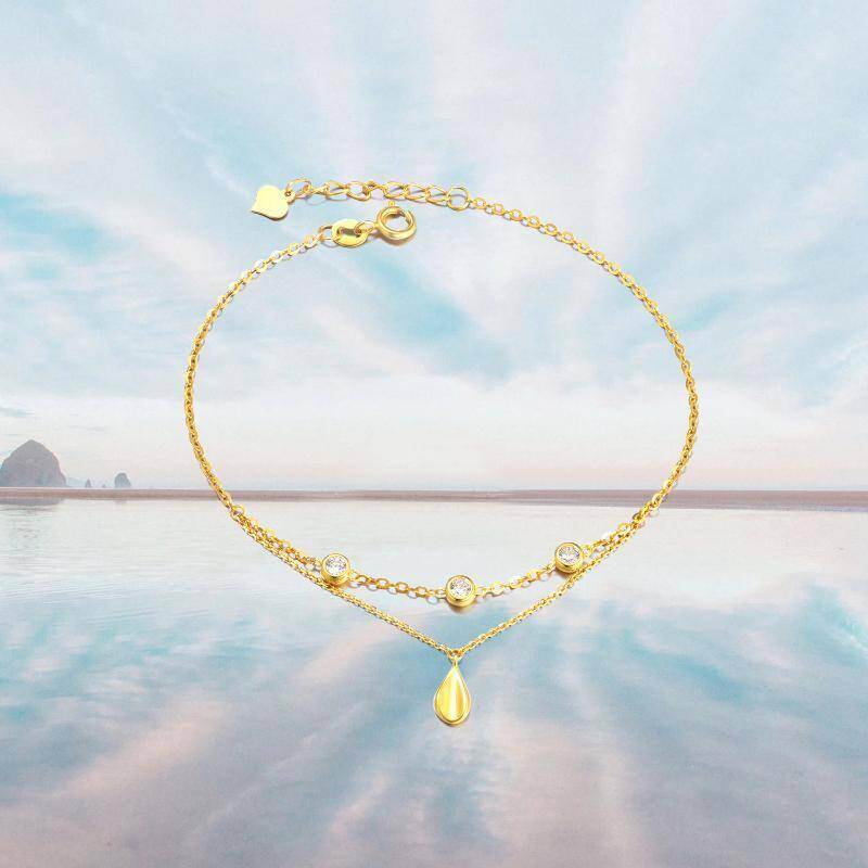 Pulsera con dije en forma de gota de circonita cúbica en oro blanco de 10 quilates-4