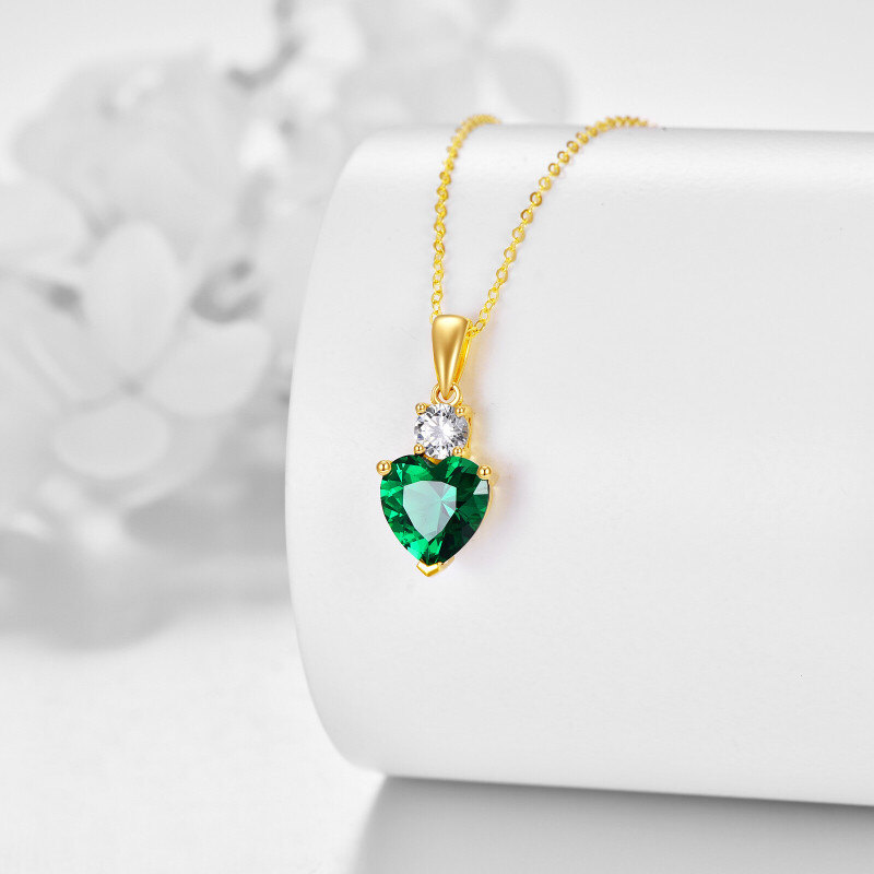 Halskette mit Herzanhänger aus 10-karätigem Weißgold mit Zirkonia und Smaragd.-3